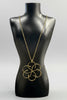 Flower gold pendant necklace side view