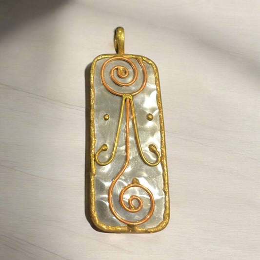 Stainless Steel pendant with brass/copper