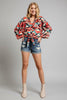 Abstract print long sleeve tie-front top