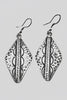 Tribal arrowhead earrings styled