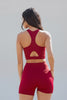 Sports bra crop top and biker shorts back view