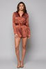 Long sleeve polka dot romper with waist belt