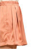 Pleated elastic waist satin shorts close up