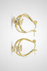 Gold teardrop rhinestone earrings, flat lay view