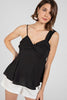 Asymmetrical neck top with twist detail