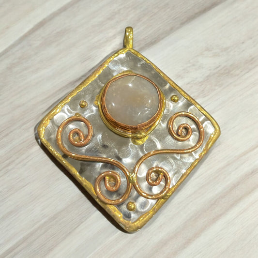 Stainless Steel pendant with brass/copper