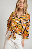 Tie-front abstract print blouse with wide sleeves