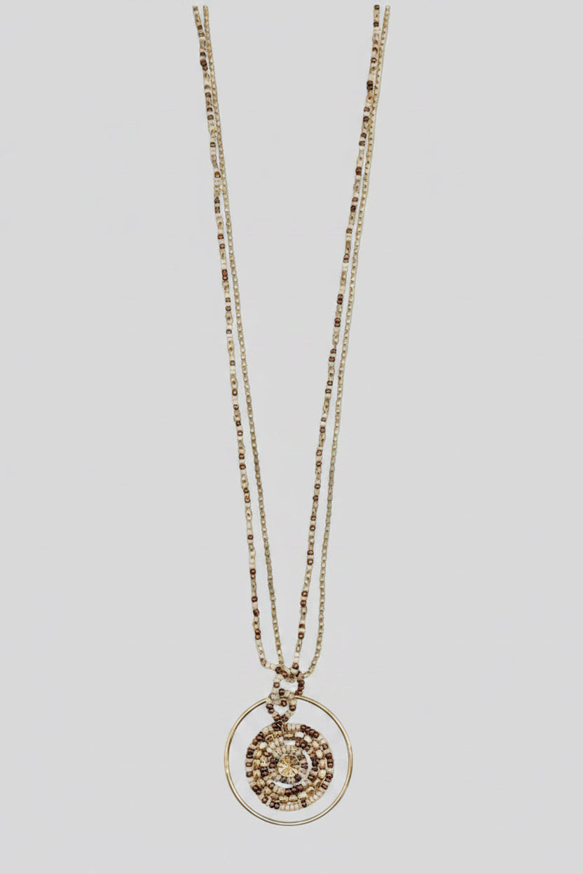 Artisanal beaded necklace in coffee and cream hues