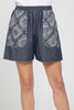 Indigo patchplay dark denim shorts, full-length view