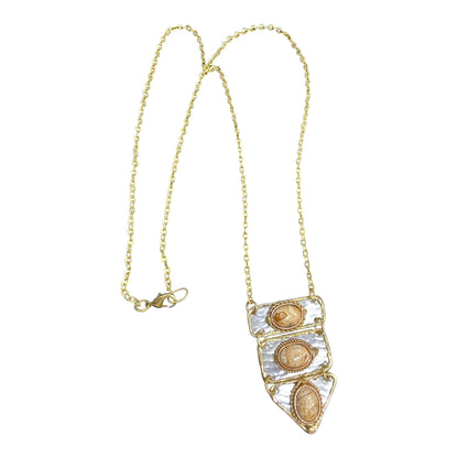Mixed metal bib necklace accented with Jasper stones.