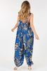 Blue floral print jumpsuit with front pockets, outfit view
