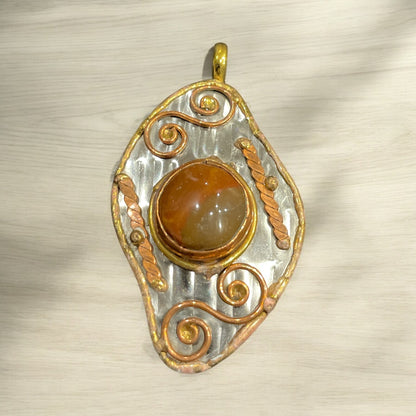 Stainless Steel pendant with brass/copper
