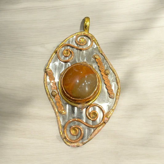 Stainless Steel pendant with brass/copper