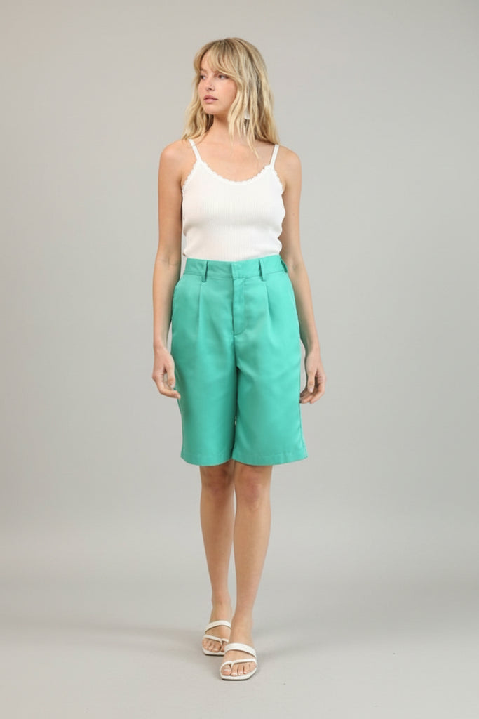 Sea green solid bermuda shorts, front view