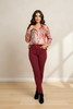 Savanna flame pink animal print blouse, styled on model
