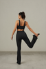Activewear flare legging and bra set, full-length view