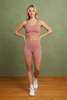 Sports bra and biker short set detail