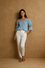 Off-shoulder twist-front top, lifestyle flat lay