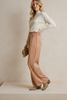 Wide-leg satin trousers in golden cream, professional look