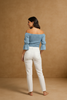 Solid twist-front off-shoulder top, full-length view