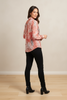 Pink animal print button-down blouse, side view