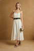 Black leather-line raffia sandals by Mandalay and Company