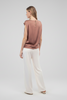Boat neck elasticized hem blouse styled